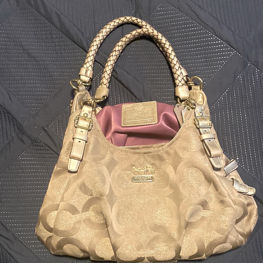 Gently used…Gold/metallic Coach!